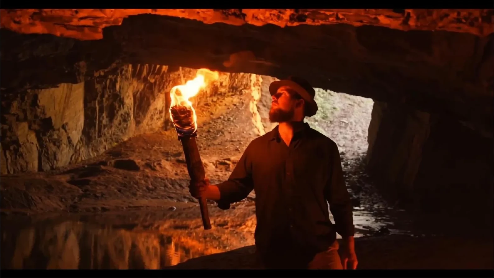 Realistic fire VFX added to a torch in a cave shot with Beeble Canvas